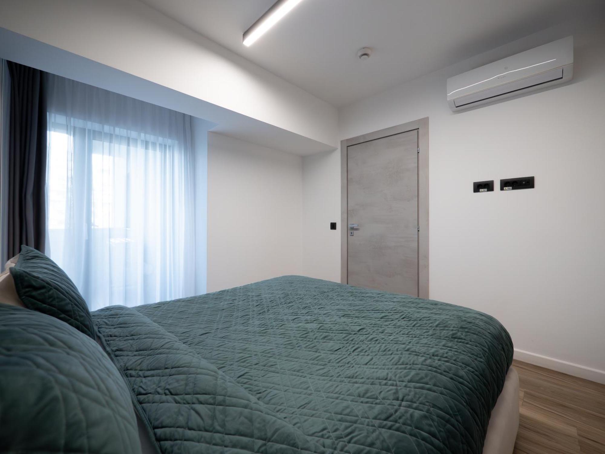 Novos Luxury Suites Бухарест Экстерьер фото